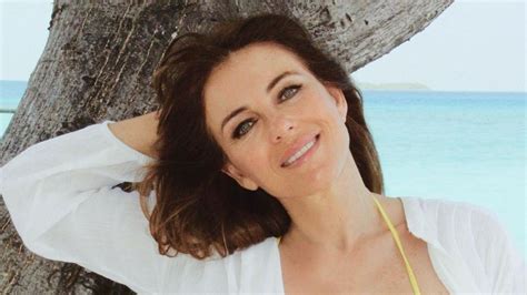 elizabeth hurley hot pics|Elizabeth Hurley, 58, is a bombshell in tiny string bikini。